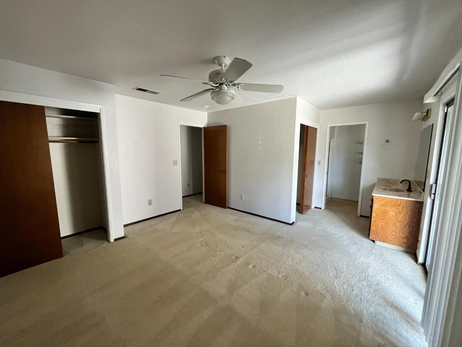 312 Roxanne Drive Patterson, CA 95363 - Photo 23 of 28 a view of a storage & utility room with a sink