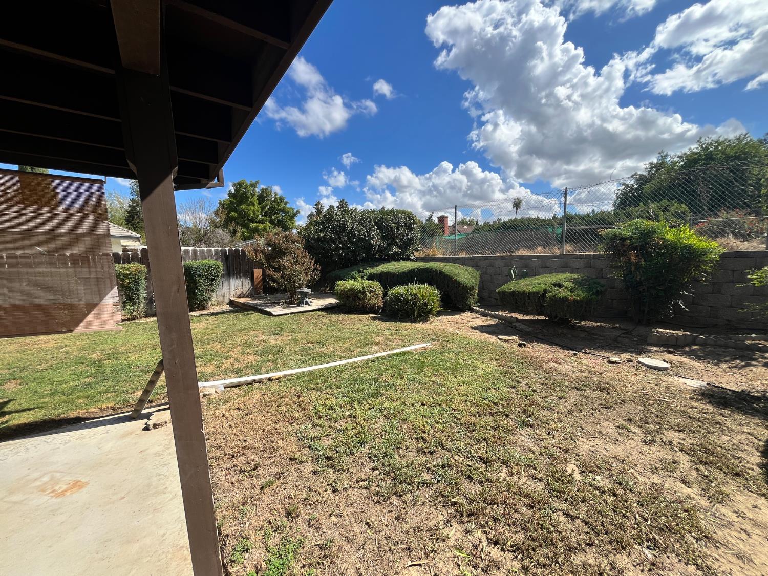312 Roxanne Drive Patterson, CA 95363 - Photo 27 of 28 a view of a backyard