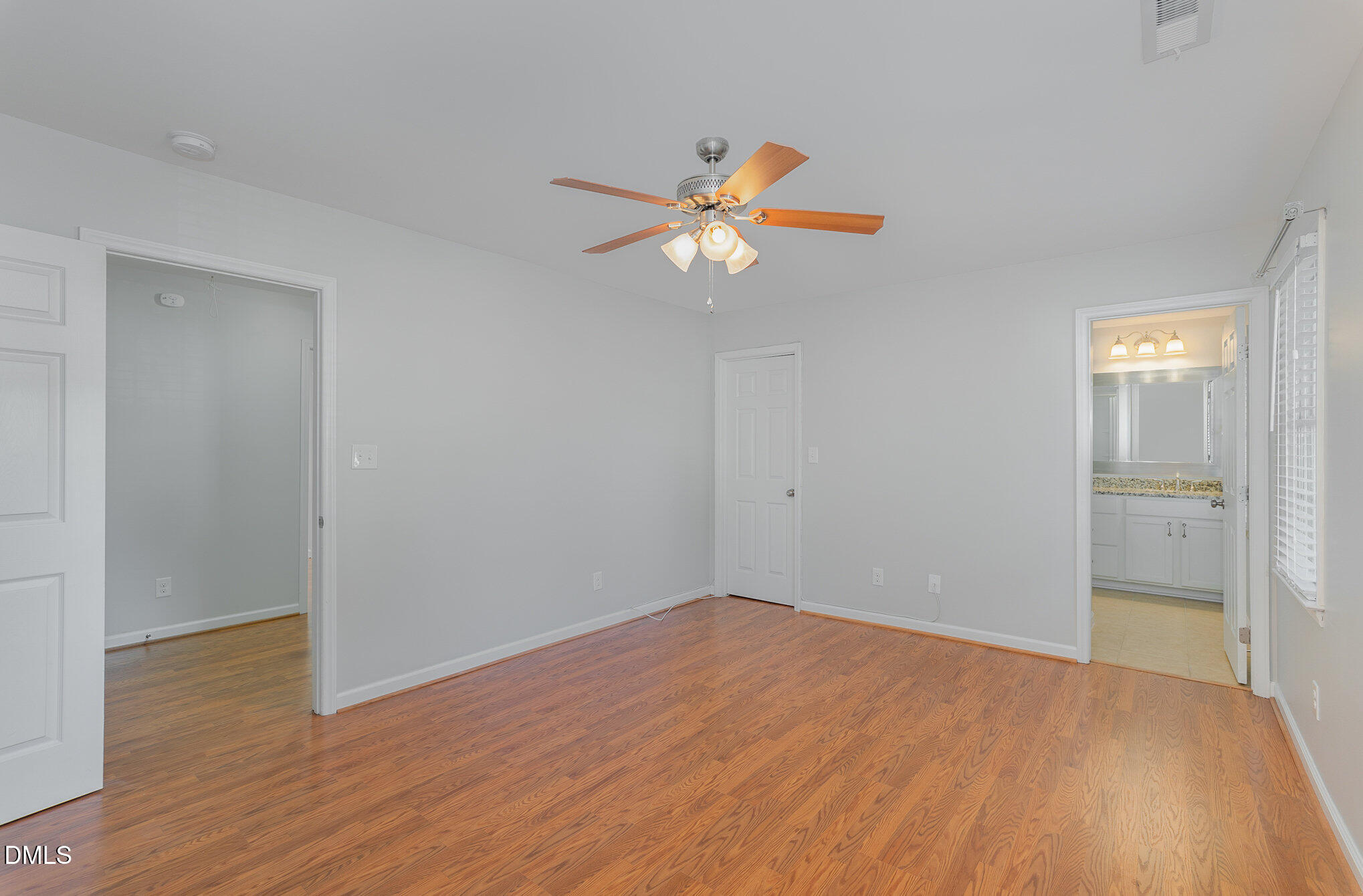 1437 Greenside Drive Raleigh, NC 27609 - Photo 16 of 27 a view of empty room with wooden floor