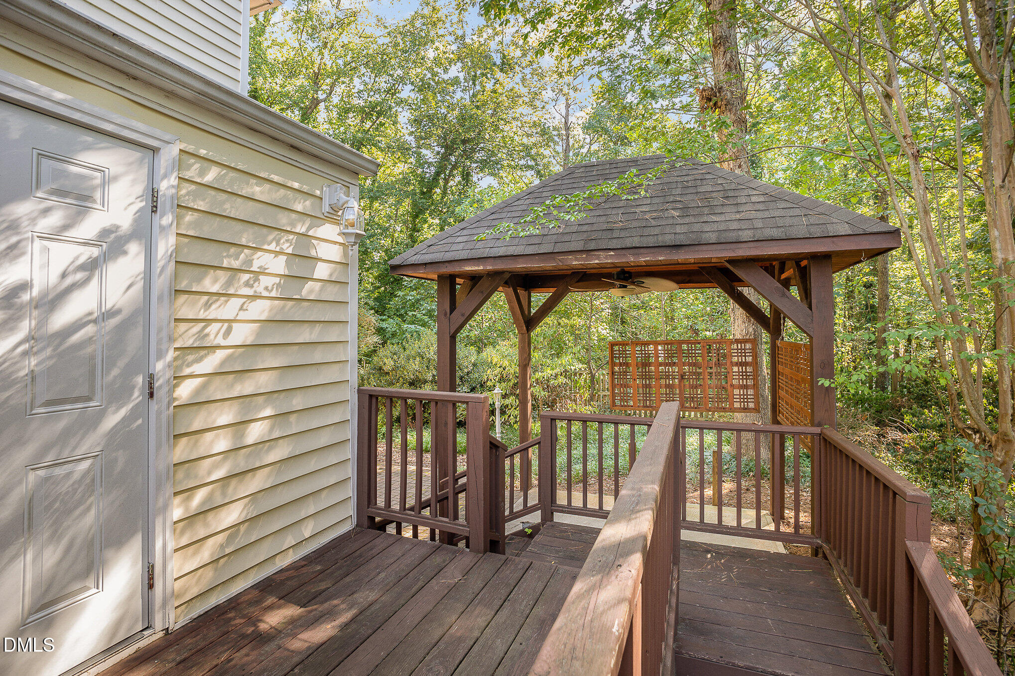 1437 Greenside Drive Raleigh, NC 27609 - Photo 25 of 27 a view of balcony with wooden floor and outdoor seating