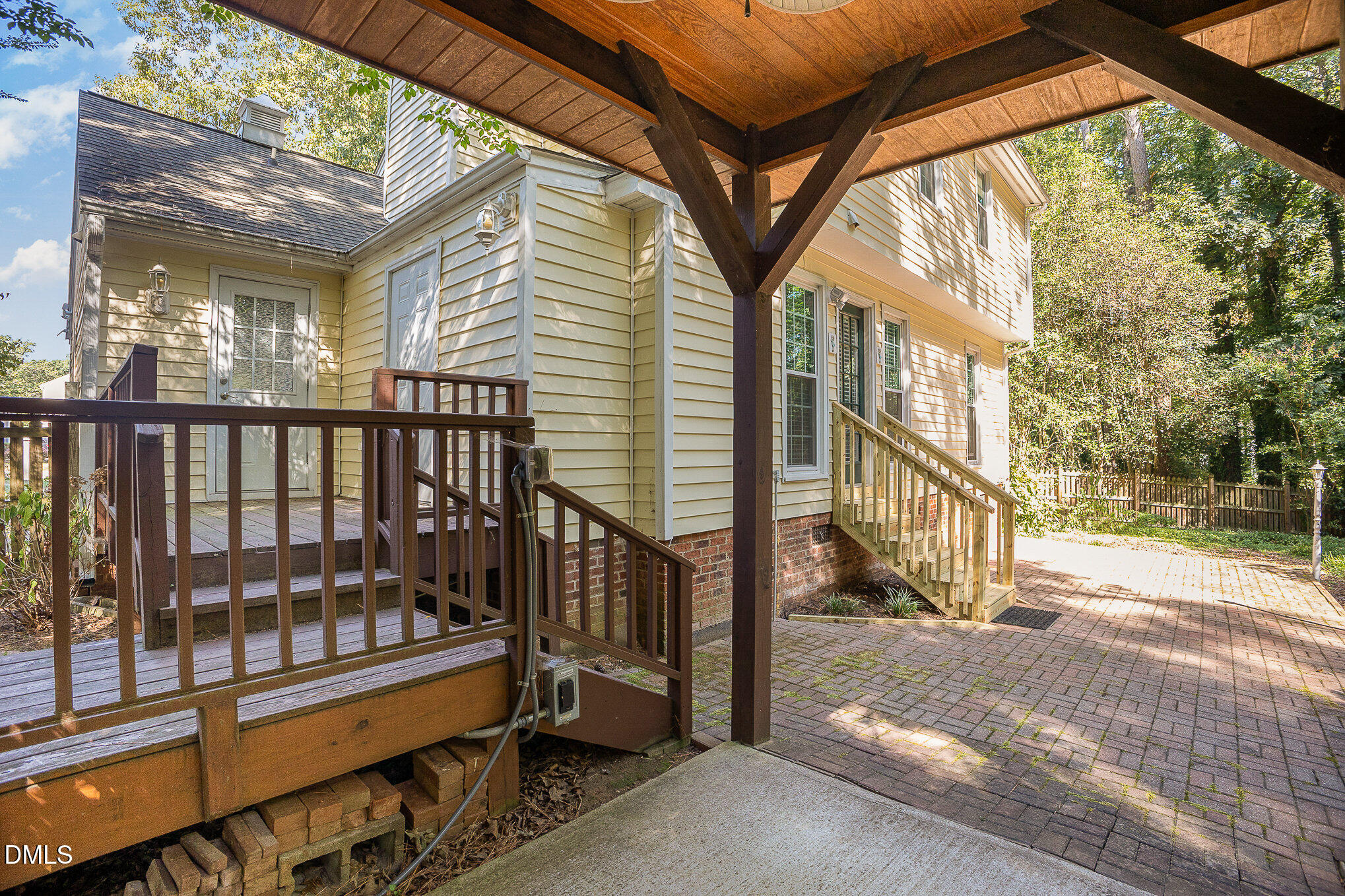 1437 Greenside Drive Raleigh, NC 27609 - Photo 27 of 27 a view of a porch with a small yard