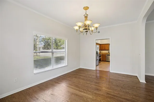 a view of a livingroom with furniture and a fireplace