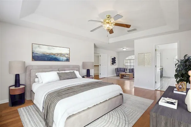 a kitchen with granite countertop a sink cabinets and stainless steel appliances