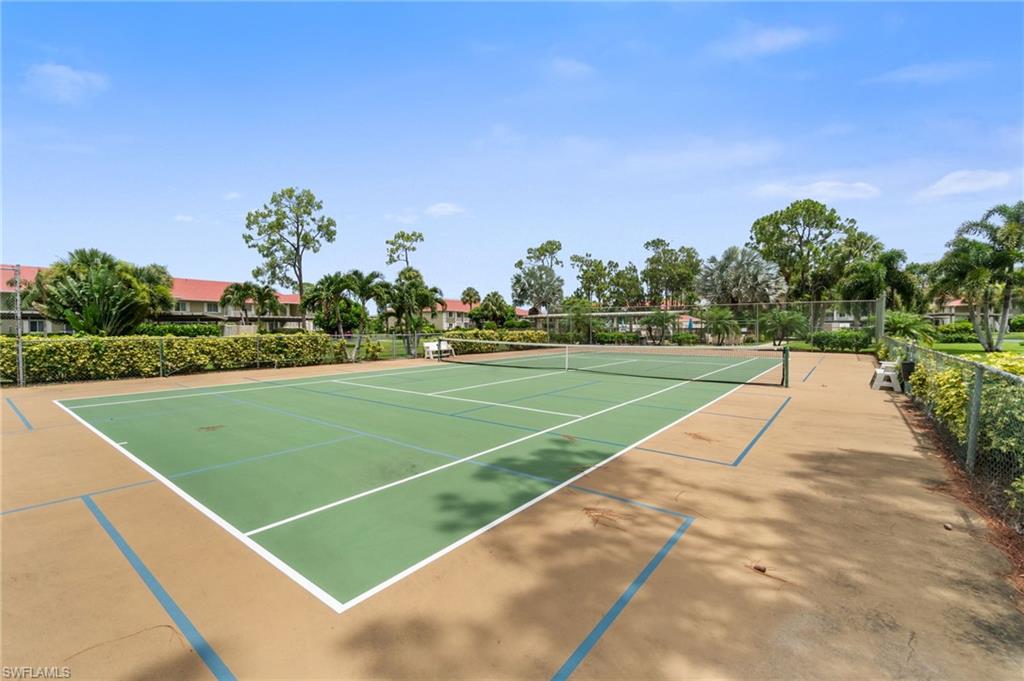 4572 Andover Way, Unit C105 Naples, FL 34112 - Photo 31 of 50 a view of a tennis court