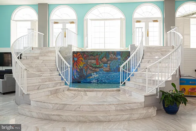 a view of an entryway with a garden