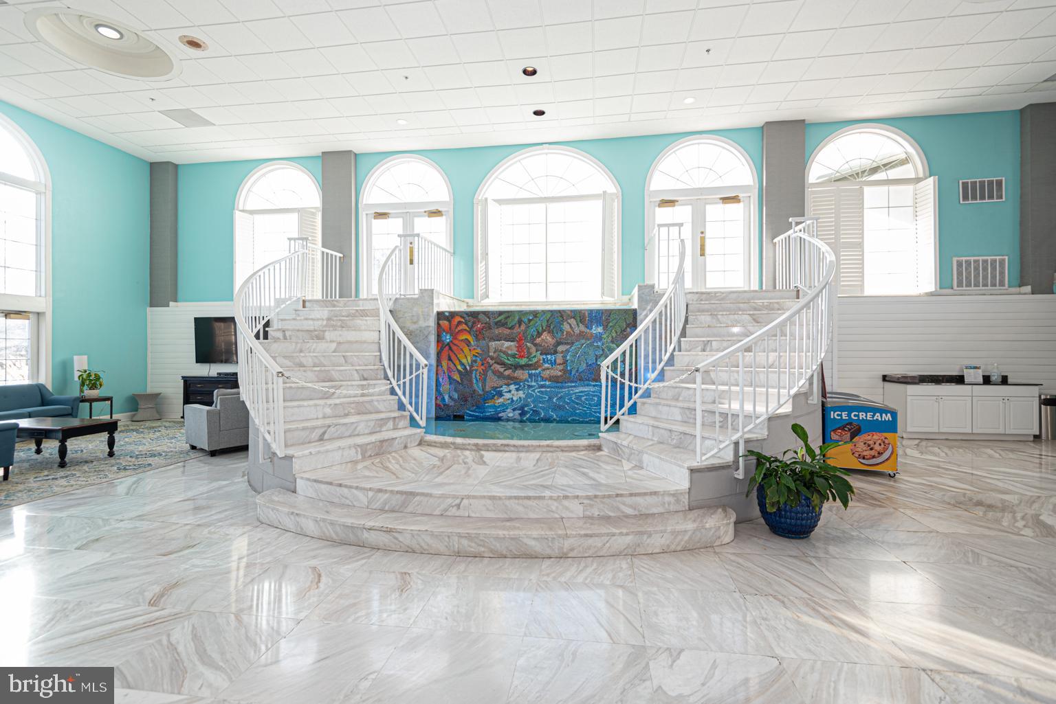 200 59th Street, Unit 209 Ocean City, MD 21842 - Photo 35 of 49 a view of lobby with furniture and wooden floor