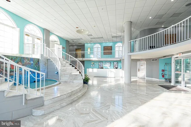 a gym room with lots of gym equipment