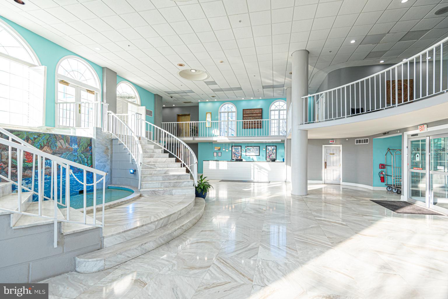 200 59th Street, Unit 209 Ocean City, MD 21842 - Photo 36 of 49 a view of an entryway with a garden