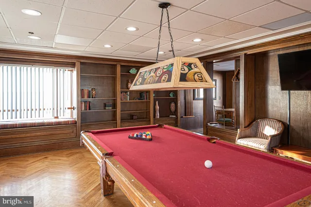 a view of a livingroom with furniture and window