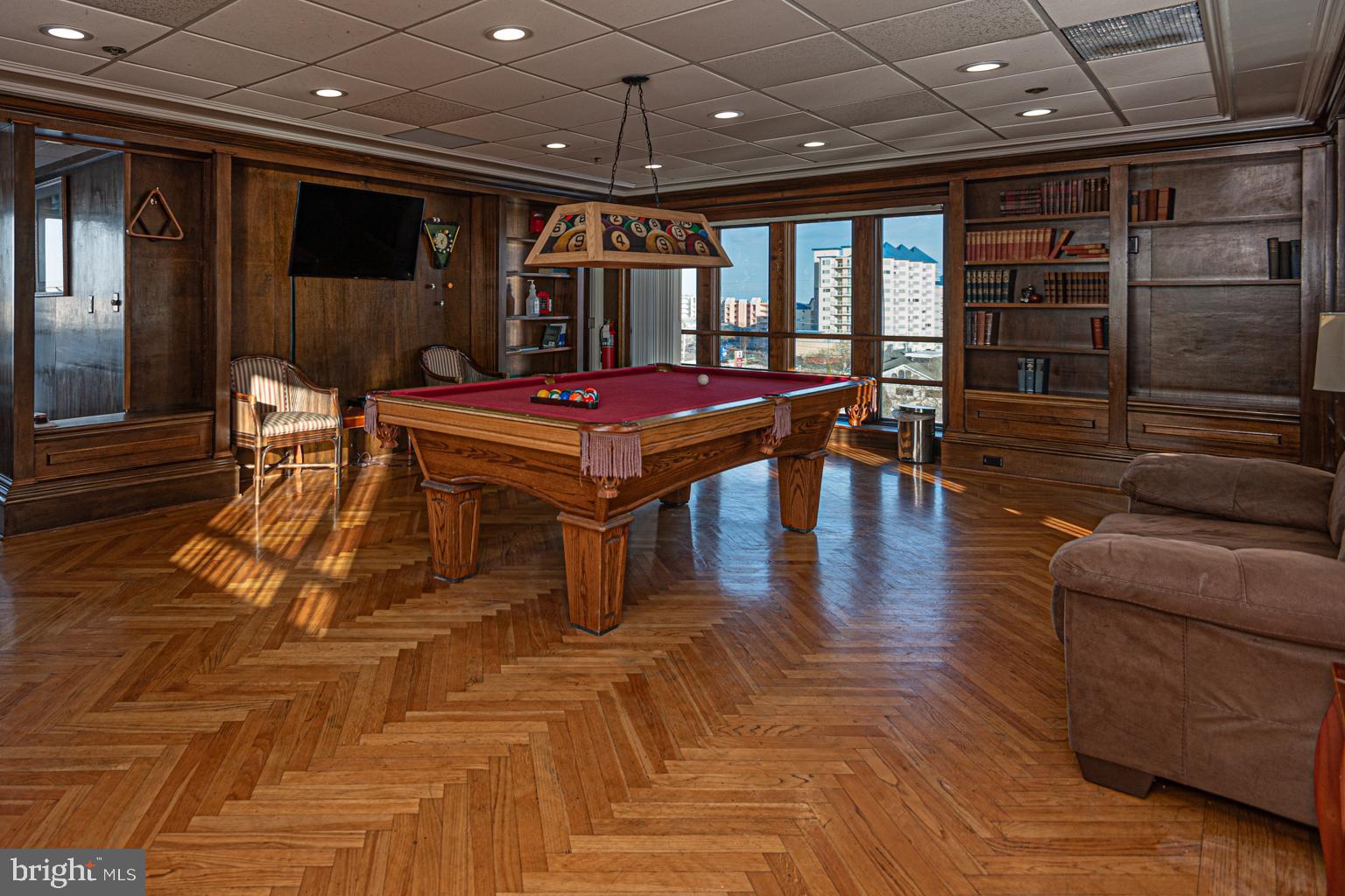 200 59th Street, Unit 209 Ocean City, MD 21842 - Photo 43 of 49 a room with furniture and pool table