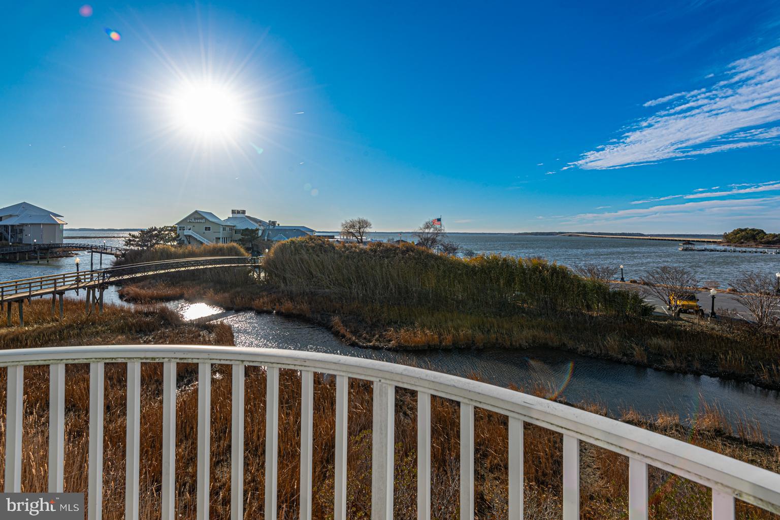200 59th Street, Unit 209 Ocean City, MD 21842 - Photo 7 of 49 a view of a balcony with an outdoor space and seating