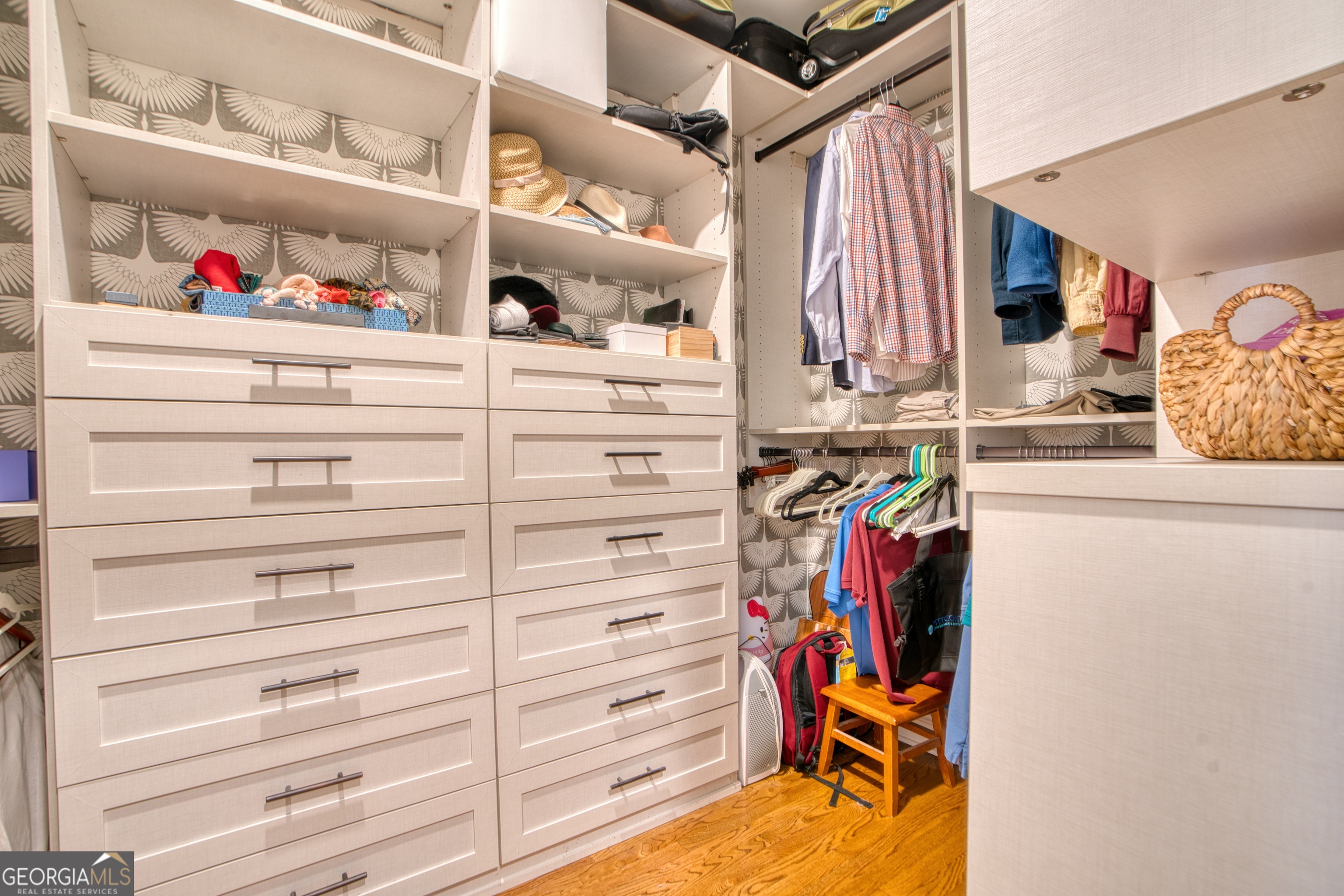 201 Bass Avenue Southwest Rome, GA 30165 - Photo 13 of 32 a view of walk in closet with clothes and shoes