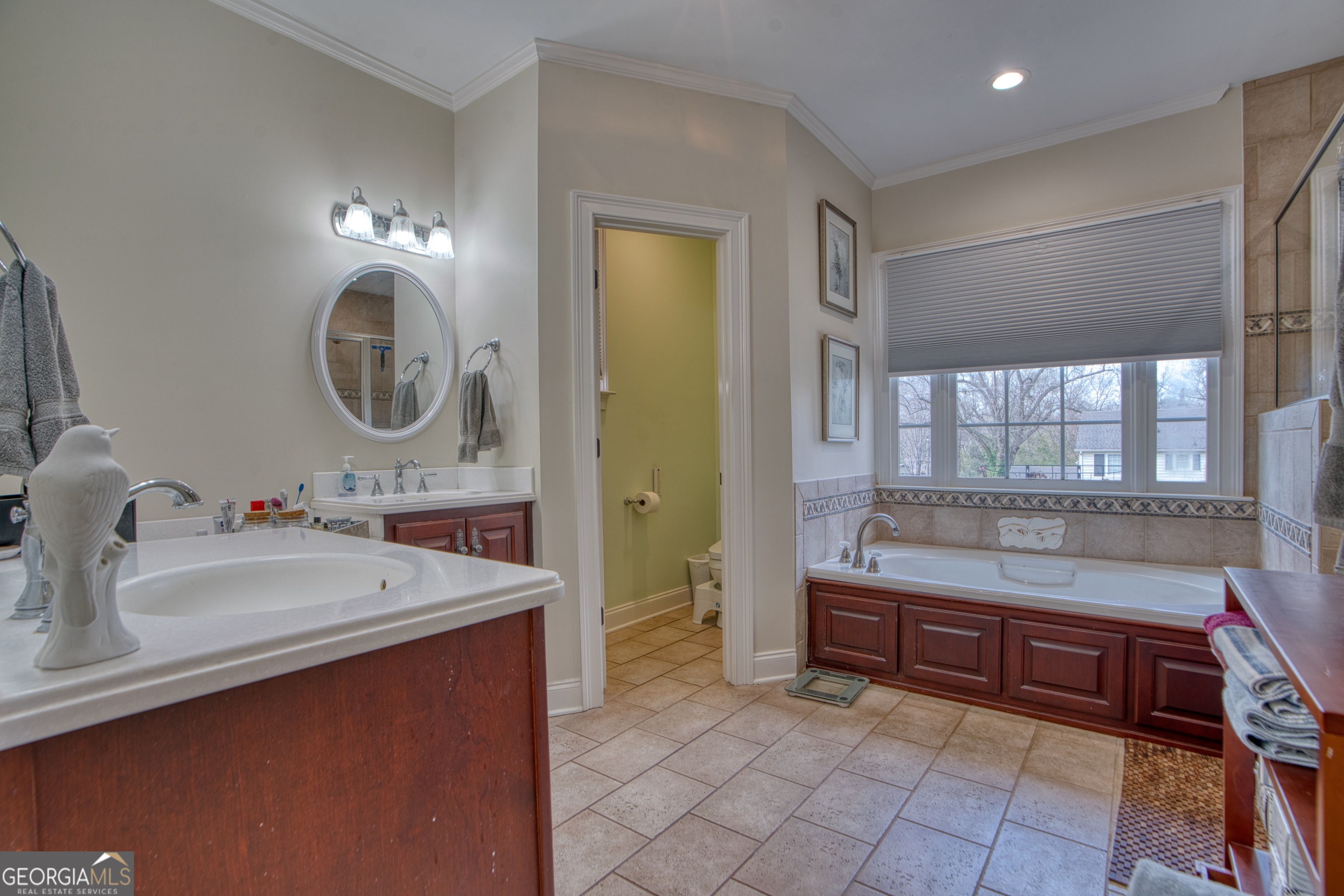 201 Bass Avenue Southwest Rome, GA 30165 - Photo 14 of 32 a spacious bathroom with a tub sink and mirror
