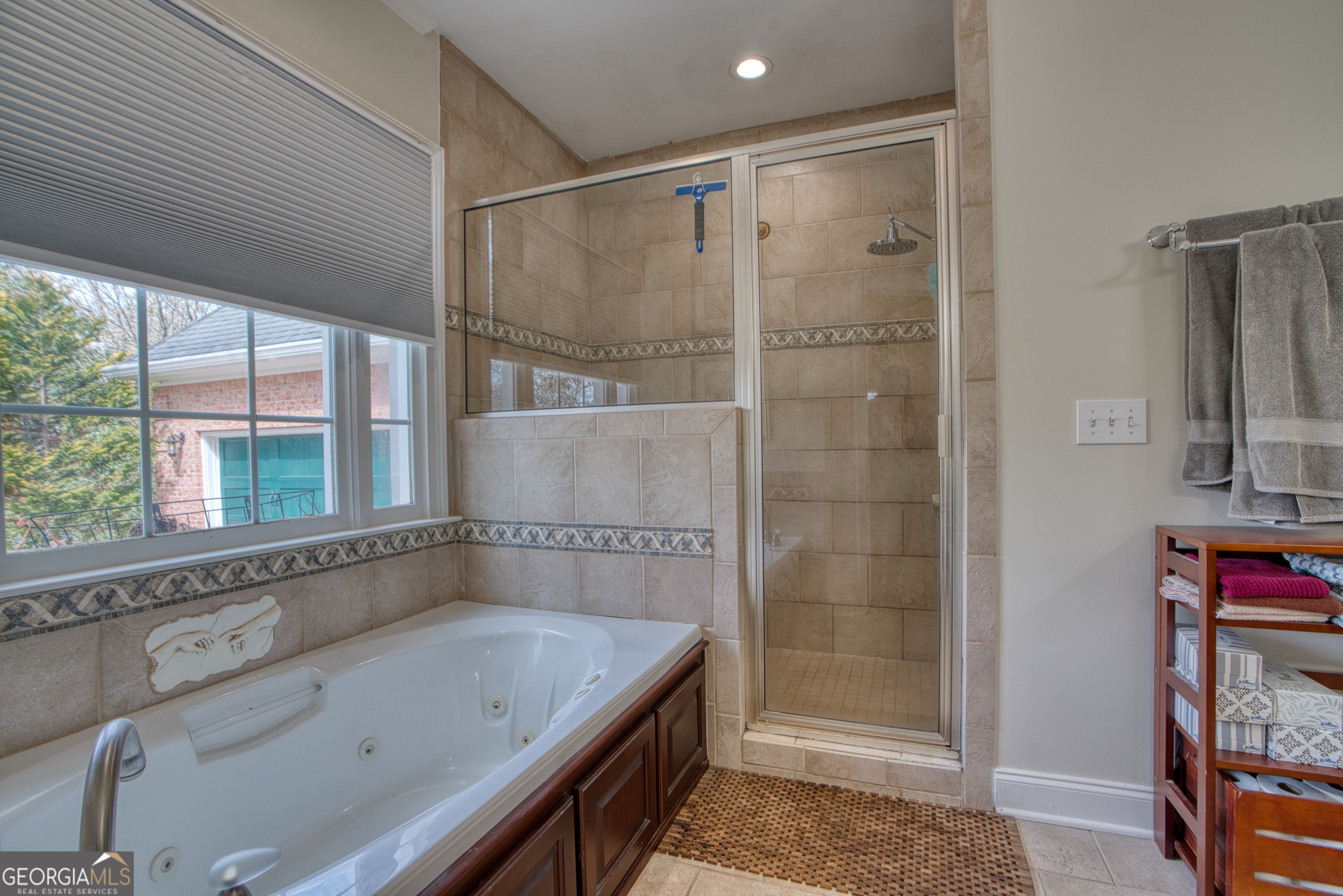 201 Bass Avenue Southwest Rome, GA 30165 - Photo 15 of 32 a bathroom with a tub and a shower