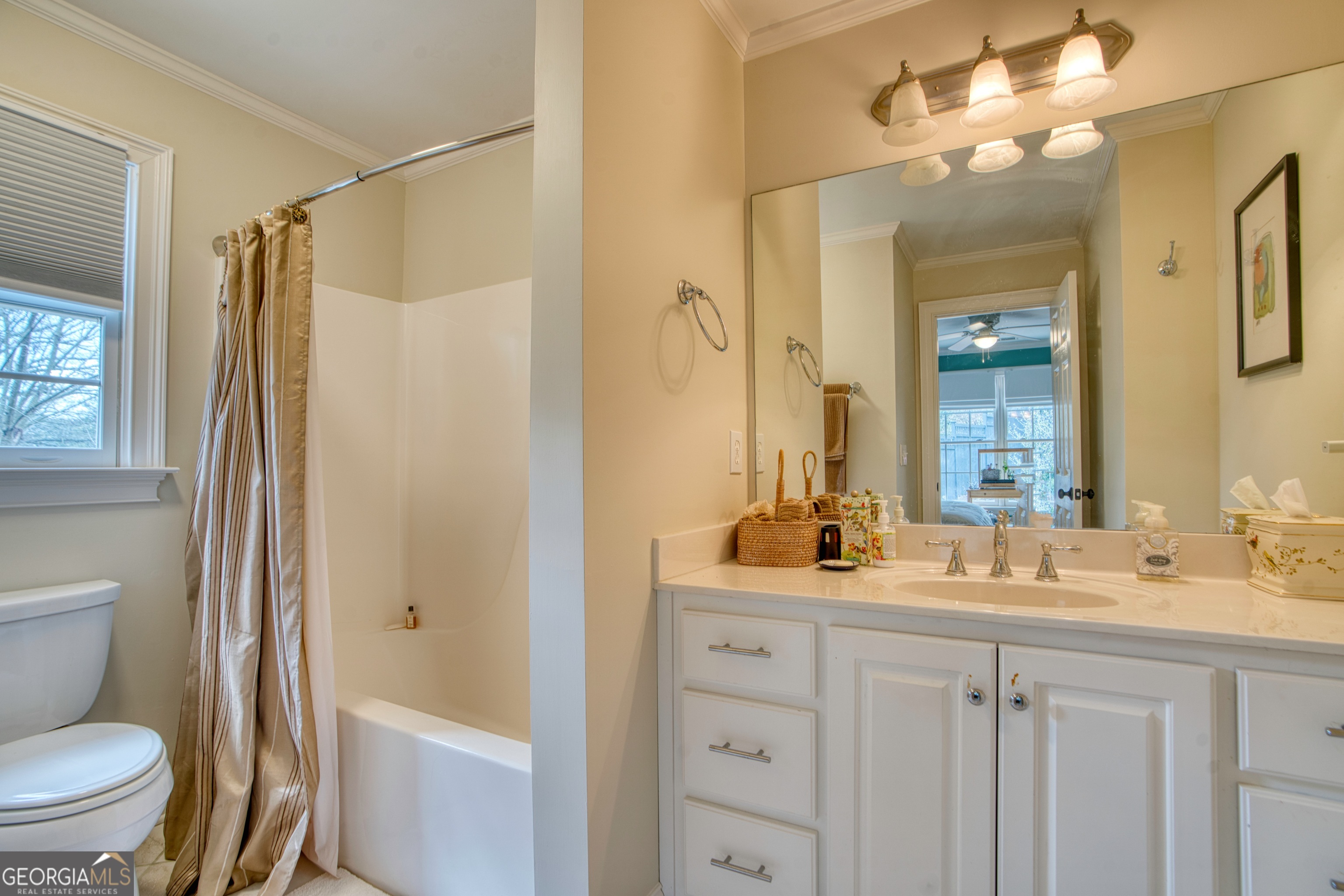 201 Bass Avenue Southwest Rome, GA 30165 - Photo 17 of 32 a bathroom with a double vanity sink mirror and toilet
