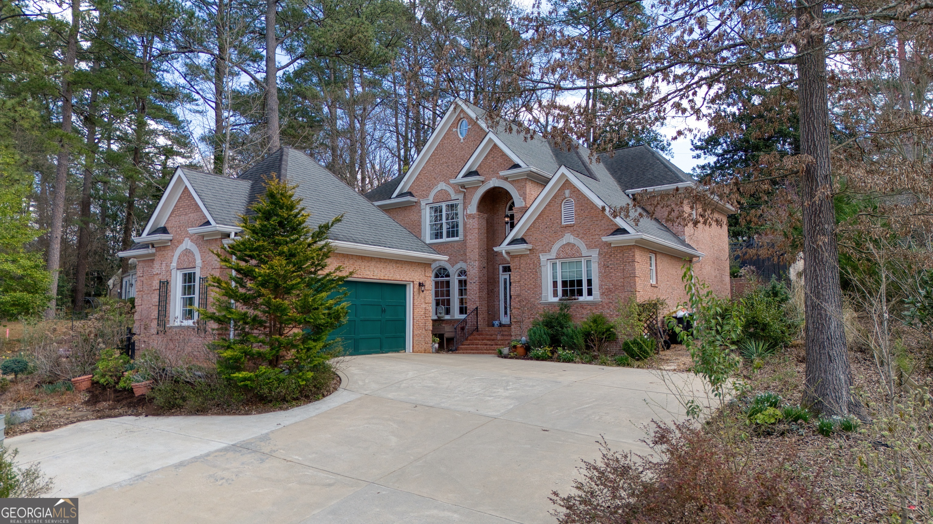 201 Bass Avenue Southwest Rome, GA 30165 - Photo 2 of 32 a front view of a house with a yard and garage