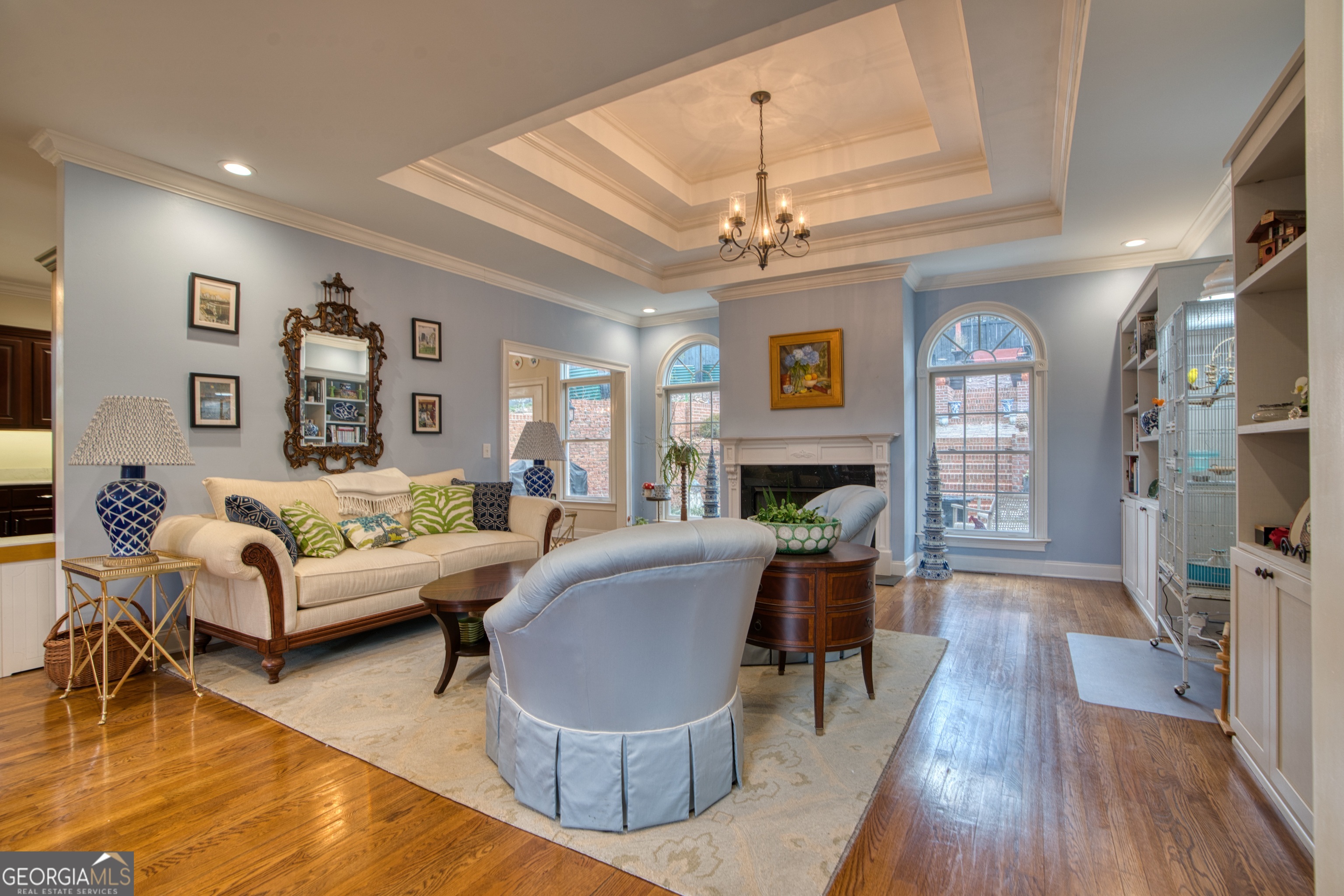 201 Bass Avenue Southwest Rome, GA 30165 - Photo 5 of 32 a living room with furniture a fireplace and a wooden floor