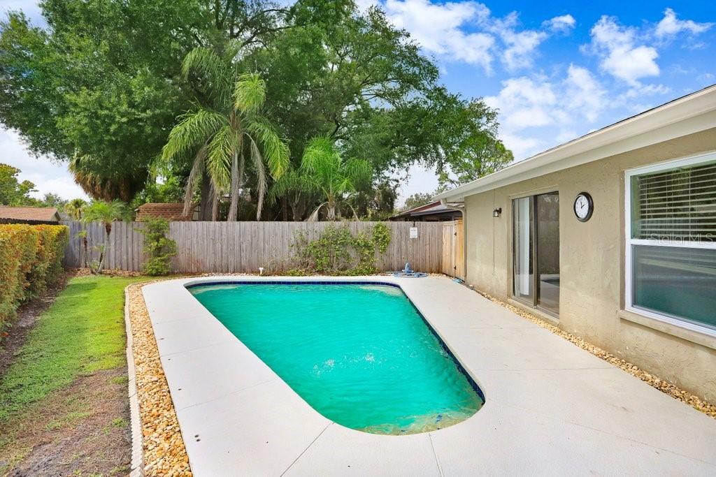 4412 Stonehenge Road Tampa, FL 33624 - Photo 32 of 33 a view of outdoor space yard and swimming pool