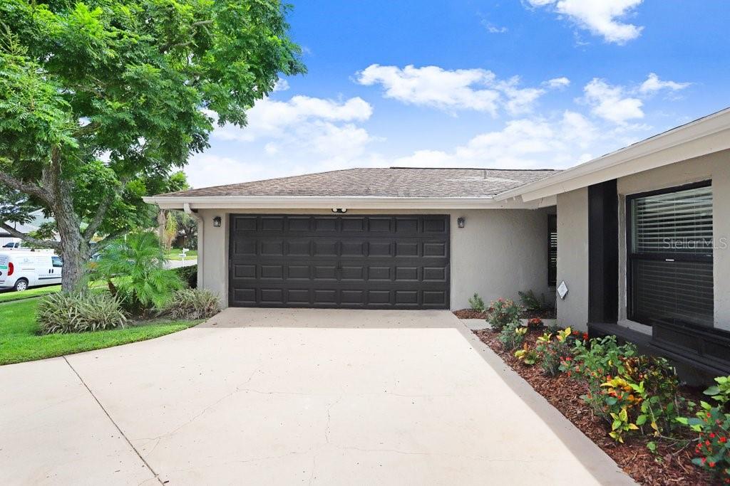 4412 Stonehenge Road Tampa, FL 33624 - Photo 4 of 33 a front view of house with yard