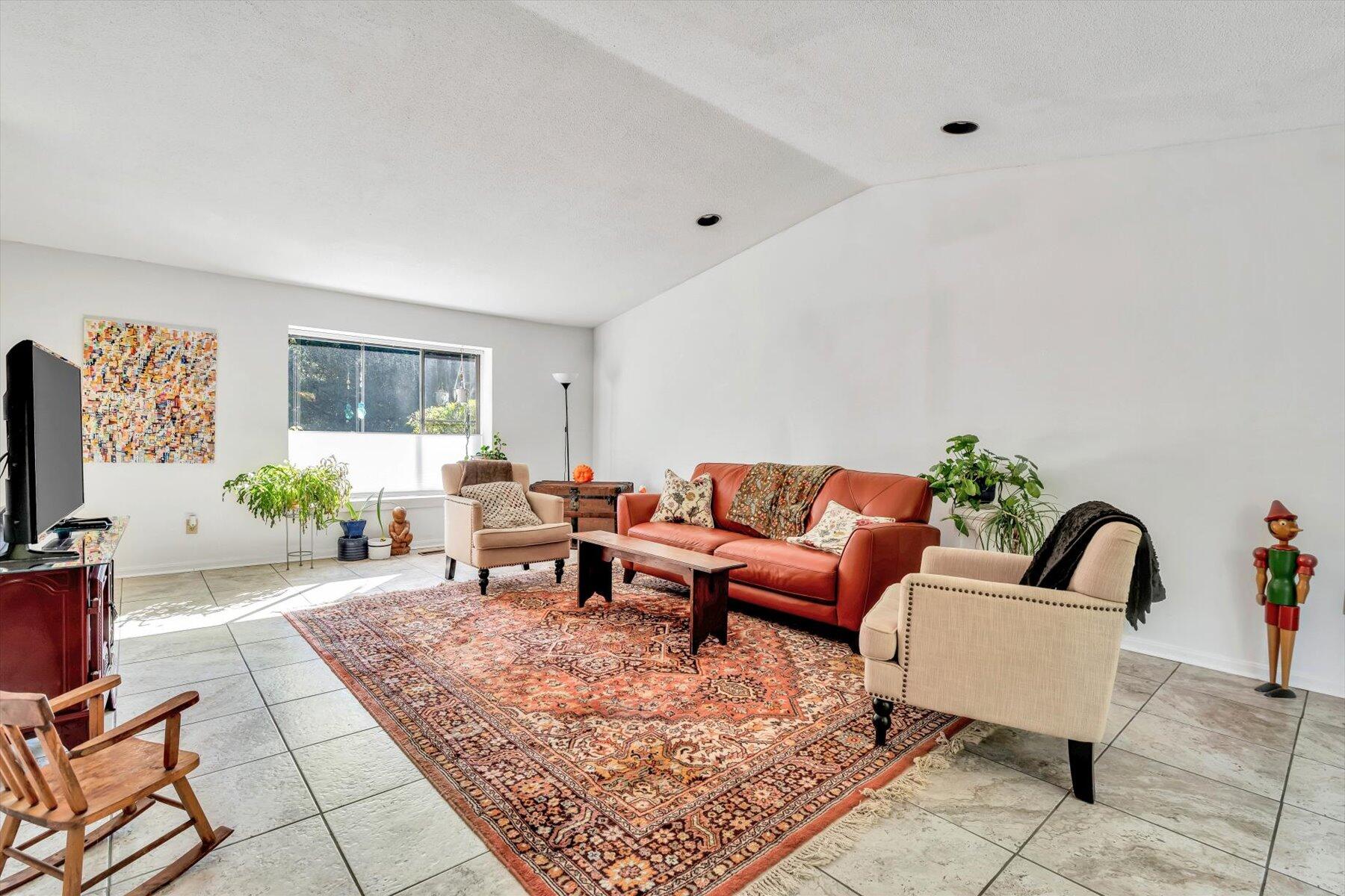 481 Buck Island Road, Unit 9AA West Yarmouth, MA 02673 - Photo 15 of 41 a living room with furniture and a flat screen tv