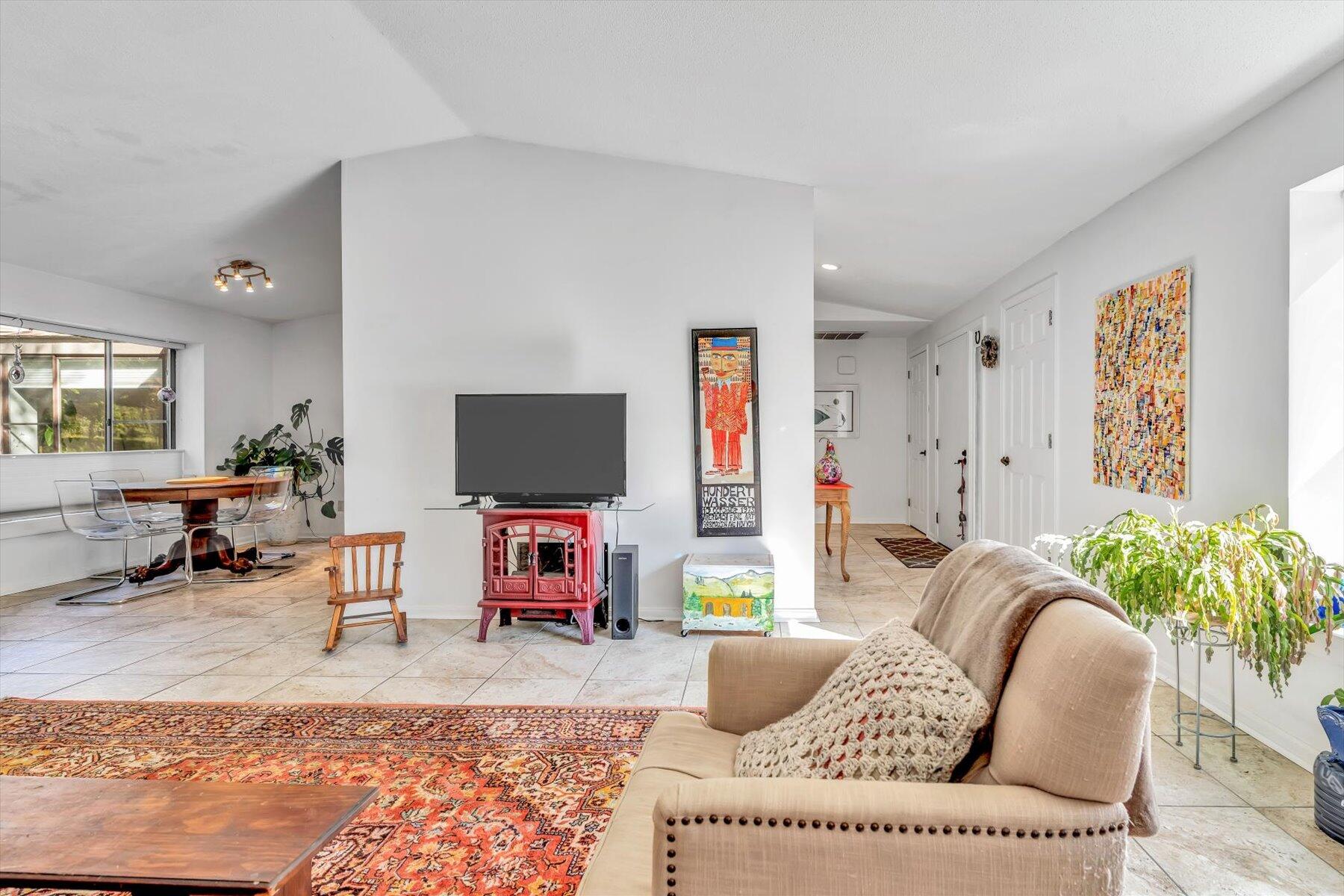 481 Buck Island Road, Unit 9AA West Yarmouth, MA 02673 - Photo 18 of 41 a living room with furniture and a flat screen tv