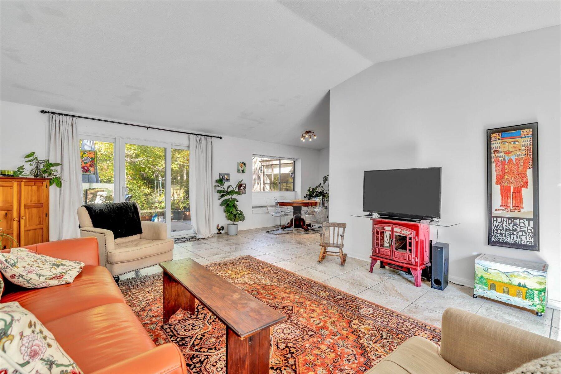 481 Buck Island Road, Unit 9AA West Yarmouth, MA 02673 - Photo 19 of 41 a living room with furniture and a flat screen tv