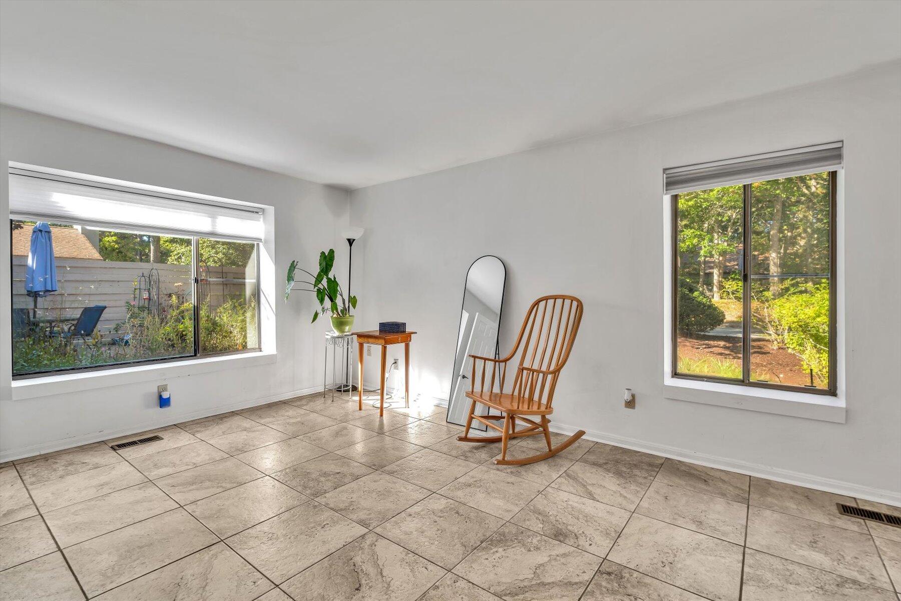 481 Buck Island Road, Unit 9AA West Yarmouth, MA 02673 - Photo 23 of 41 a view of room with windows and lounge chair