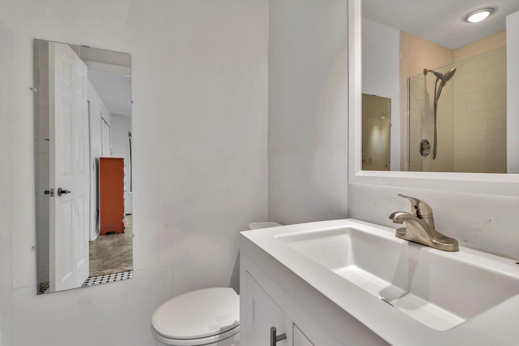 481 Buck Island Road, Unit 9AA West Yarmouth, MA 02673 - Photo 25 of 41 a bathroom with a sink a toilet and shower