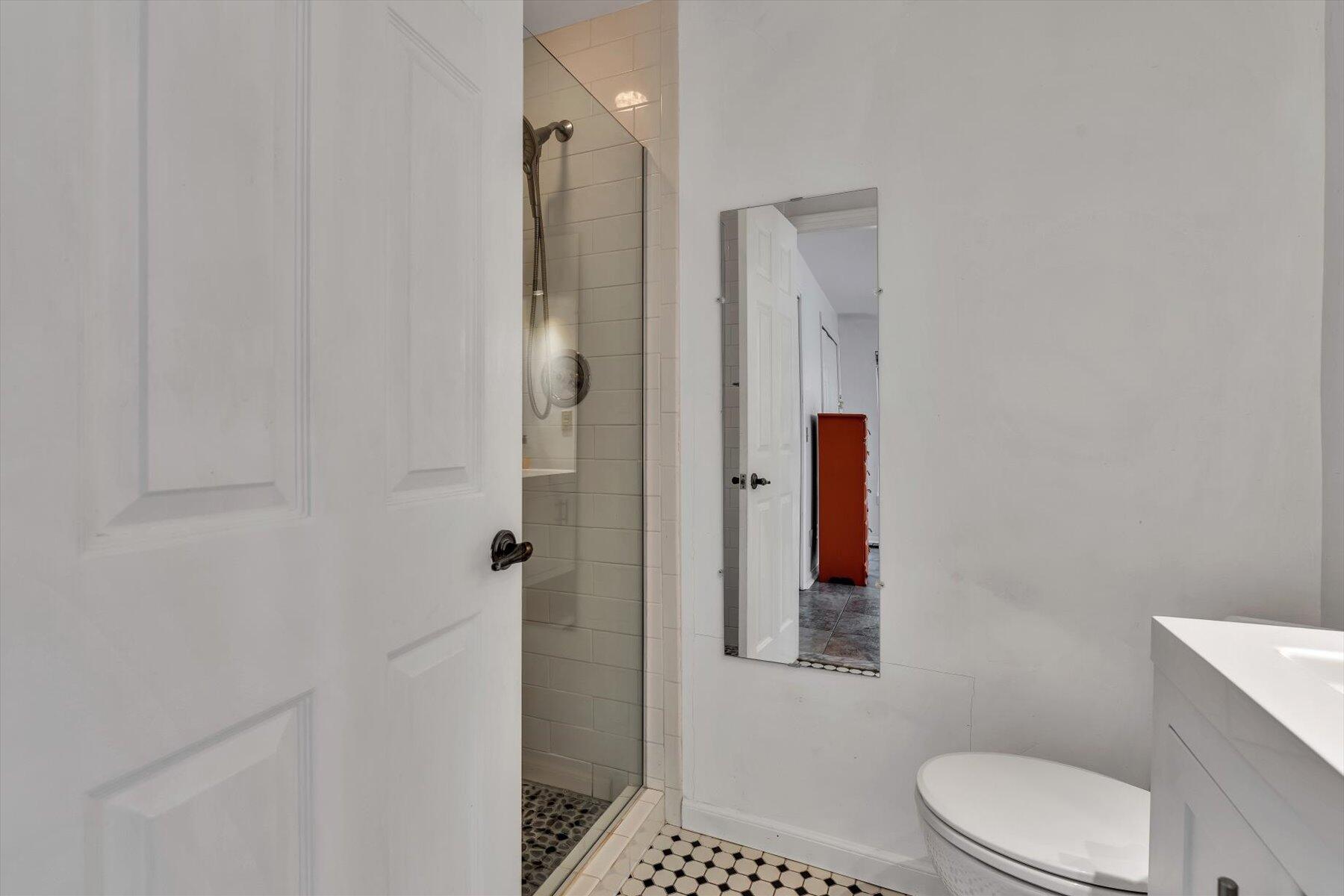 481 Buck Island Road, Unit 9AA West Yarmouth, MA 02673 - Photo 27 of 41 a bathroom with a toilet and a shower