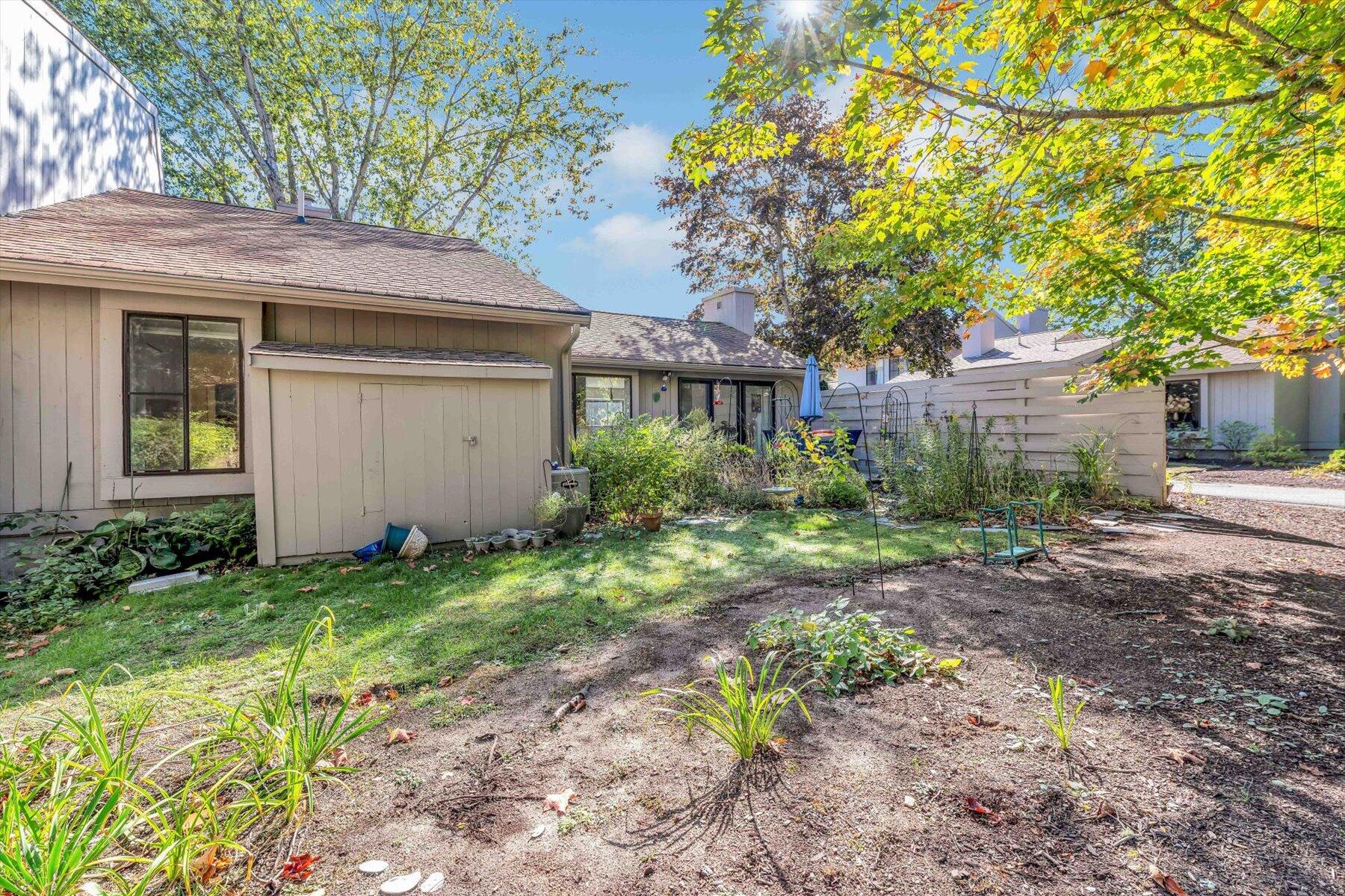 481 Buck Island Road, Unit 9AA West Yarmouth, MA 02673 - Photo 39 of 41 a view of a house with a yard