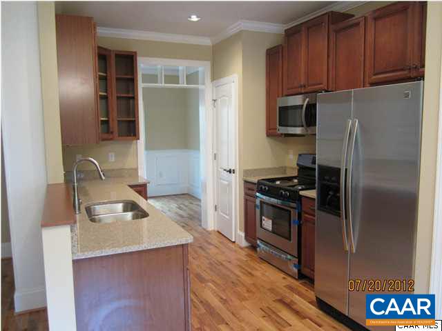 2410 Wakefield Road Charlottesville, VA 22901 - Photo 3 of 32 a kitchen with a refrigerator sink and stove