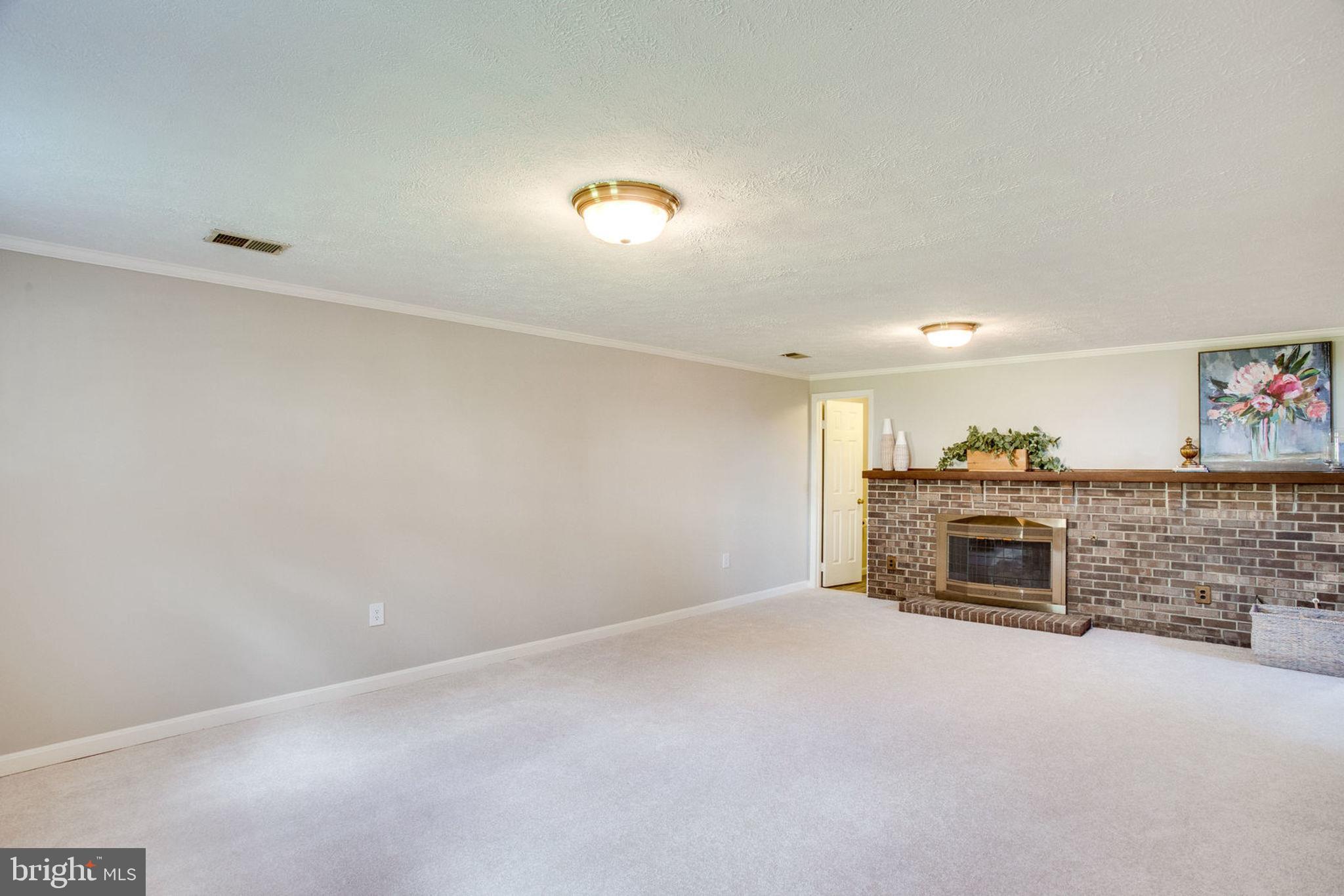 9530 Burning Branch Road Burke, VA 22015 - Photo 31 of 43 Cozy Fireplace
