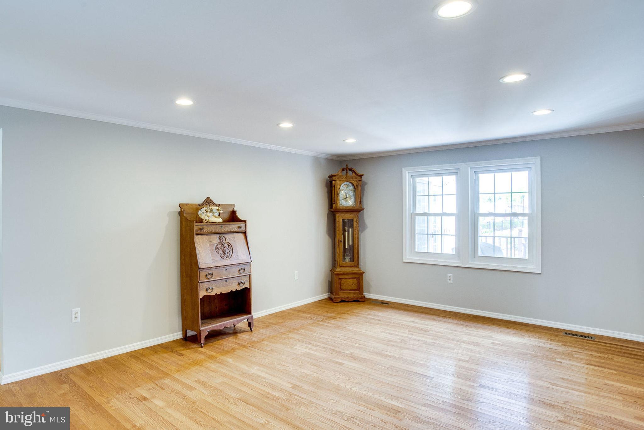 9530 Burning Branch Road Burke, VA 22015 - Photo 5 of 43 Large Living Room w/ Gleaming Hardwood Floors