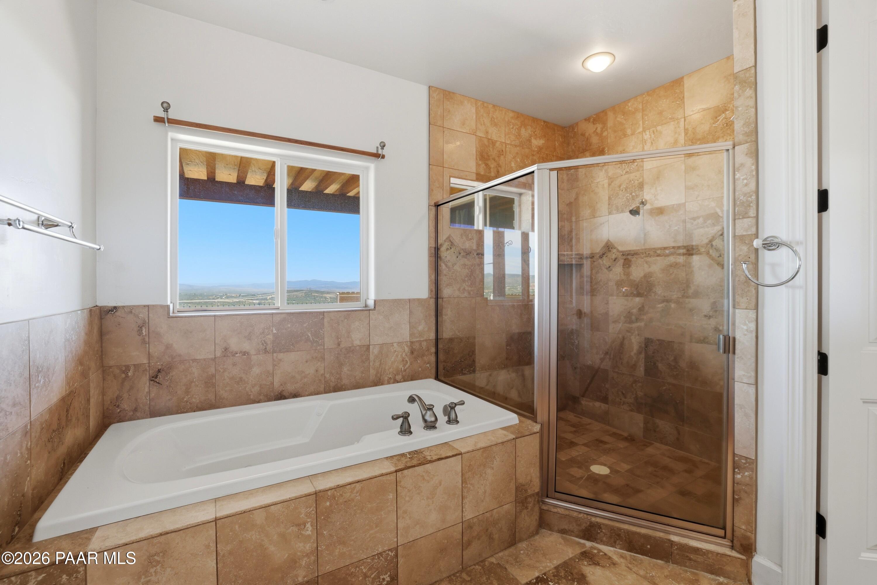 15975 Pandy Lane Dewey, AZ 86327 - Photo 23 of 39 a bathroom with a bathtub and a shower