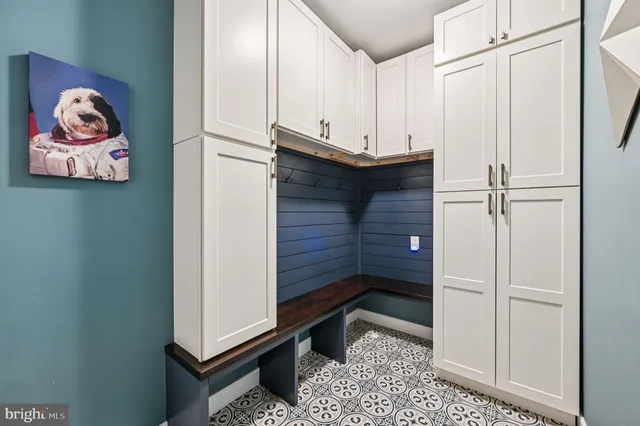 a view of a livingroom with furniture and windows