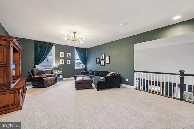 a living room with furniture or couch and a fireplace