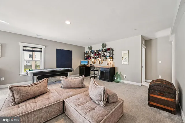an aerial view of a residential houses with outdoor space