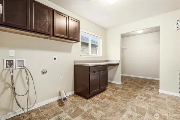 a view of cabinets with wooden floor