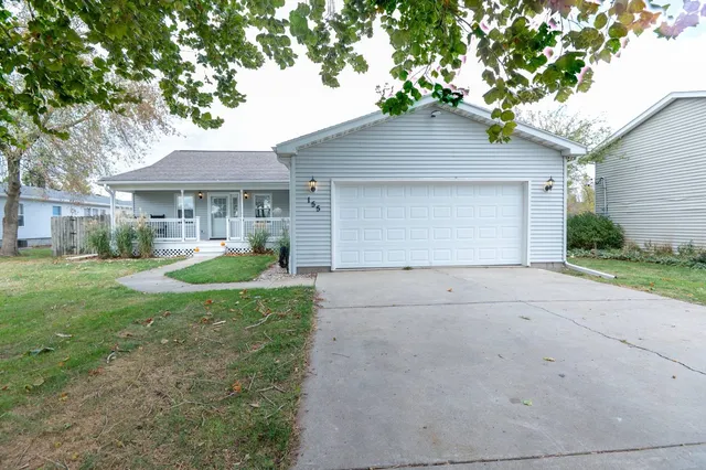 a house view with a garden space