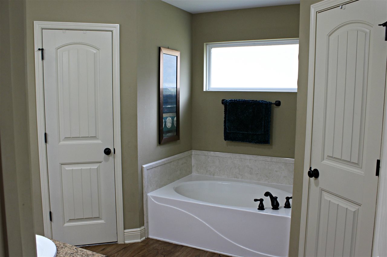1616 Thames Drive Foley, AL 36535 - Photo 11 of 18 His/Hers Closets & Garden