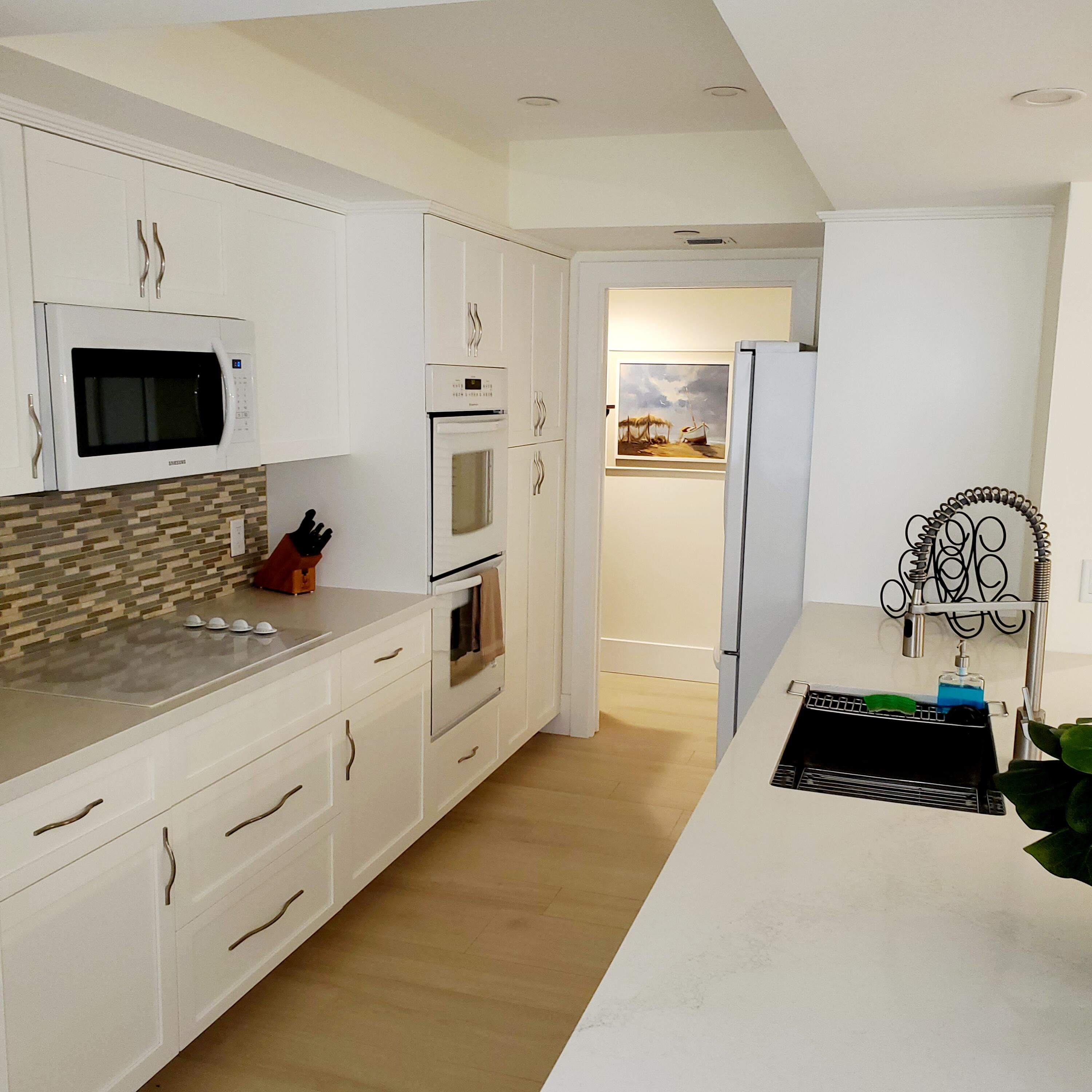 4000 North Ocean Drive, Unit 402 Riviera Beach, FL 33404 - Photo 8 of 9 M2 Kitchen 2