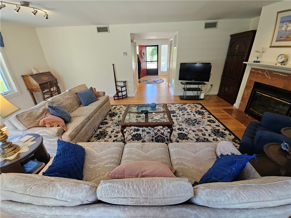 15 Hammersmith Road, Unit 33 Newport, RI 02840 - Photo 18 of 49 Living Room w fireplace view to foyer