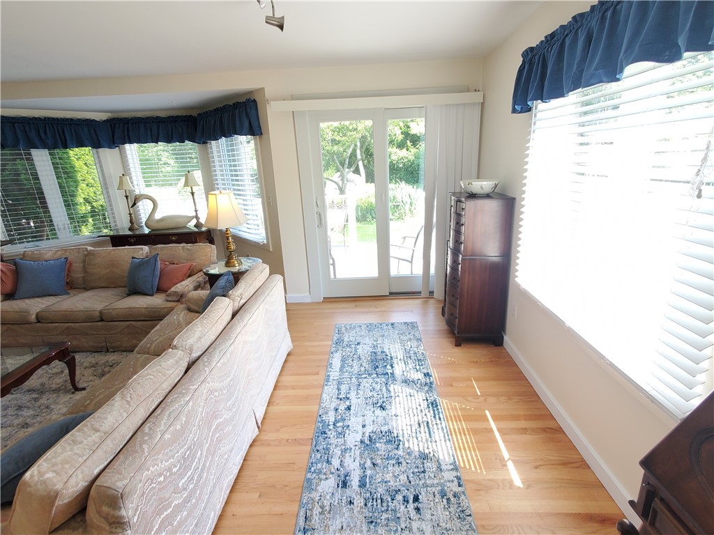 15 Hammersmith Road, Unit 33 Newport, RI 02840 - Photo 21 of 49 Living Room view to slider and deck