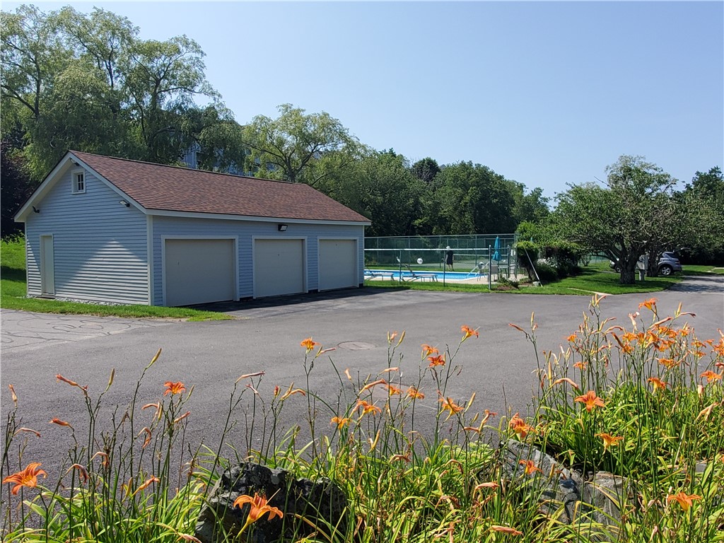15 Hammersmith Road, Unit 33 Newport, RI 02840 - Photo 44 of 49 Condo View to Garage space, Pool & Pickle Ball Courts