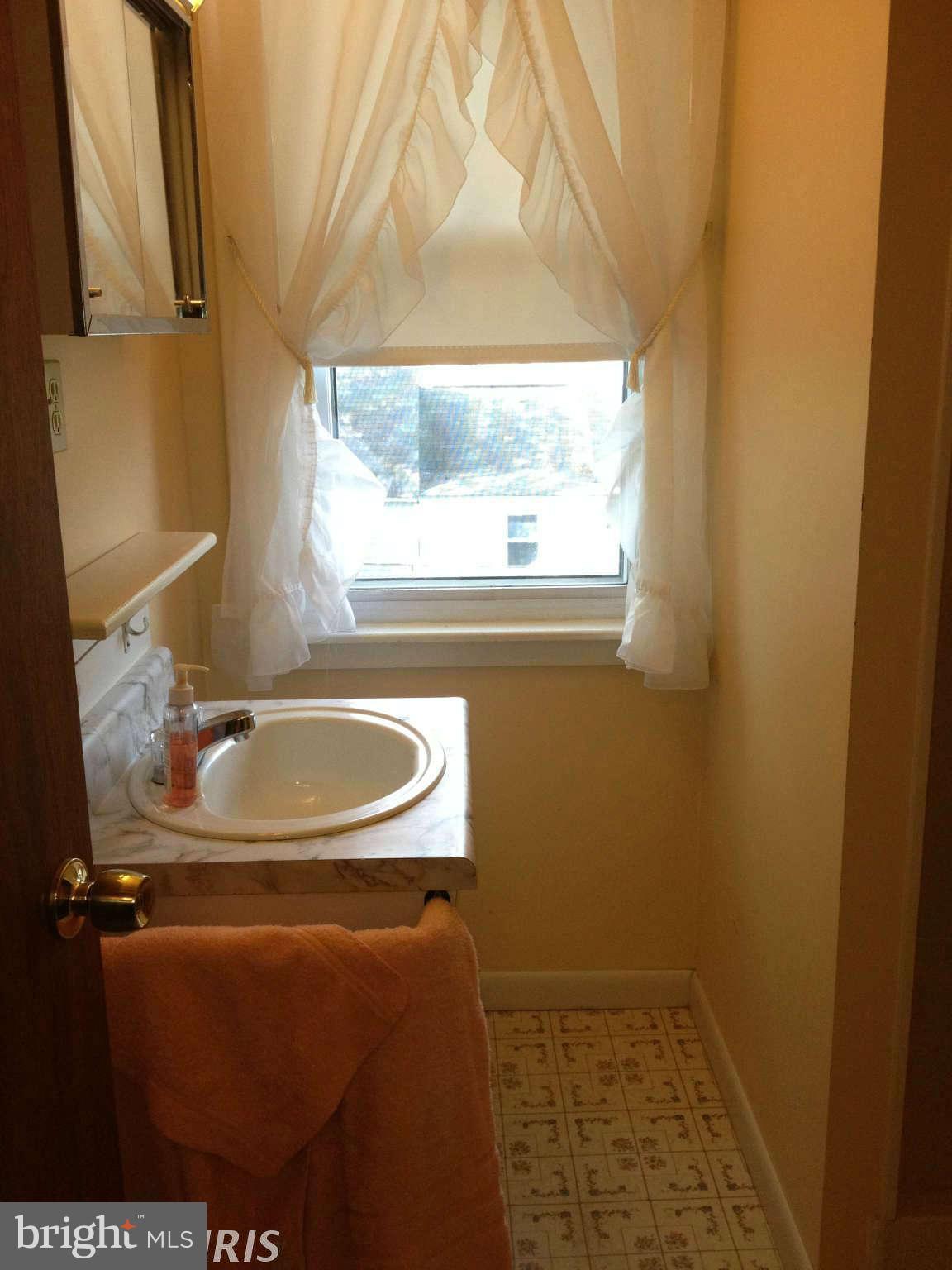 8448 Arbutus Road Pasadena, MD 21122 - Photo 19 of 30 Bath