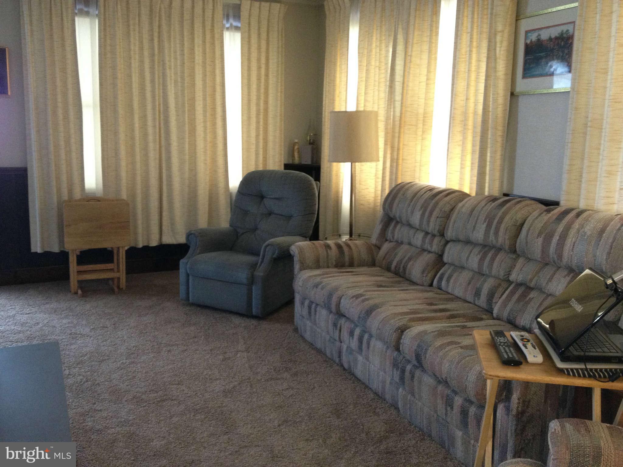 8448 Arbutus Road Pasadena, MD 21122 - Photo 4 of 30 Living Room