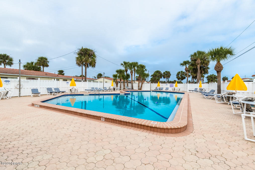 123 Cardinal Drive, Unit B Ormond Beach, FL 32176 - Photo 17 of 25 Pool 1