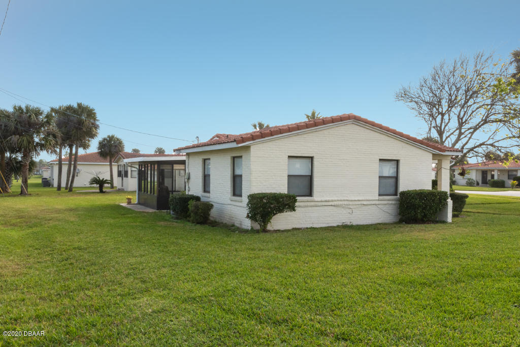 123 Cardinal Drive, Unit B Ormond Beach, FL 32176 - Photo 8 of 25 Side