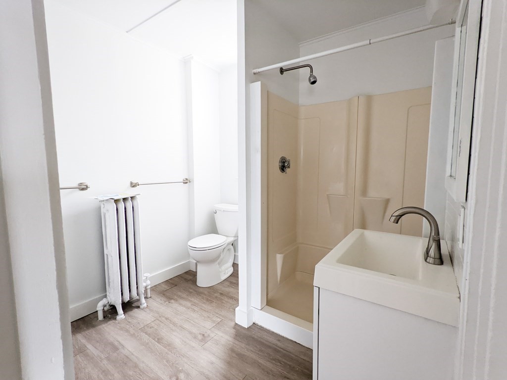 98 Pine Street Swampscott, MA 01907 - Photo 23 of 37 a bathroom with a toilet a sink and shower
