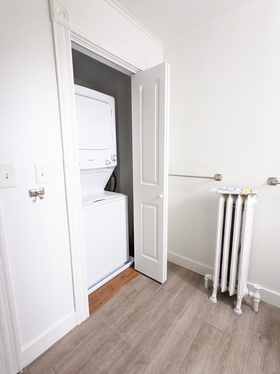 98 Pine Street Swampscott, MA 01907 - Photo 25 of 37 a view of a hallway with wooden floor and closet